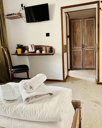 Фото номера Двухместный номер Делюкс с 1 кроватью Гостевой дом Guest House Holiday in Melnik г. Мелник 9