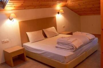 Фото номера Двухуровневый люкс Отель Elli Greco Hotel г. Мелник 7