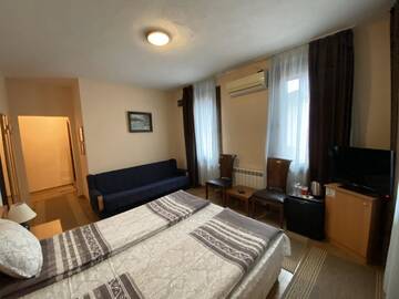 Фото номера Трехместный номер Отель Chavkova house г. Мелник 9