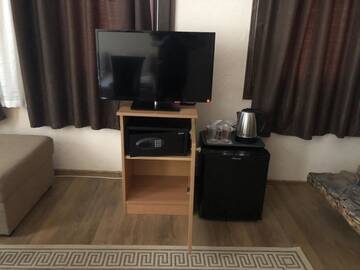 Фото номера Трехместный номер Отель Chavkova house г. Мелник 12